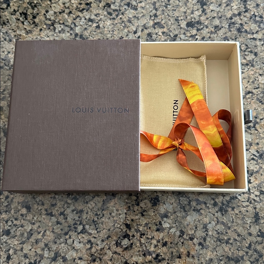 Louis Vuitton Brown Box with Vibrant Orange Ribbon